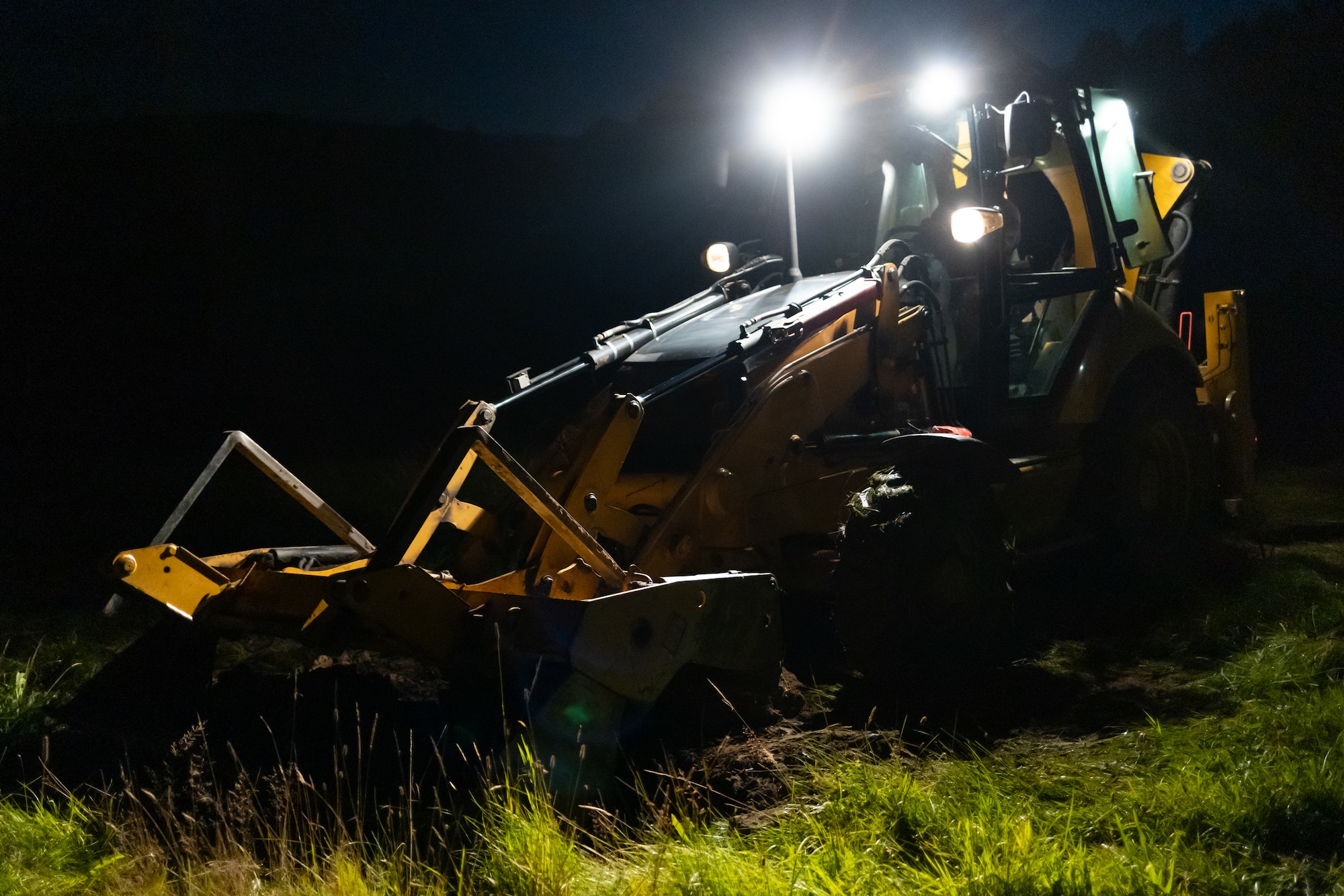 Excavator during night work